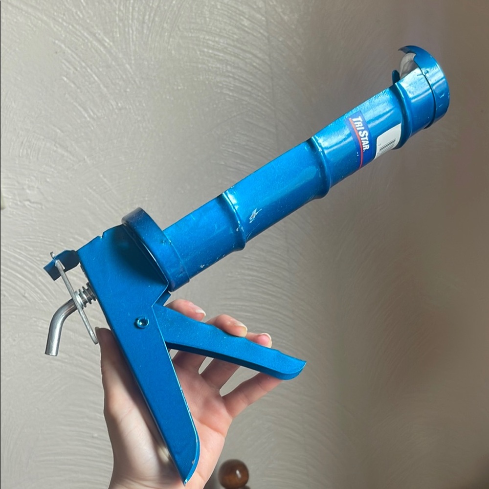 Blue Caulking Gun by TriStar